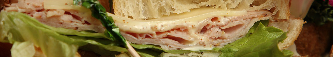 Eating Deli Sandwich at The Linden Store restaurant in Wellesley, MA.